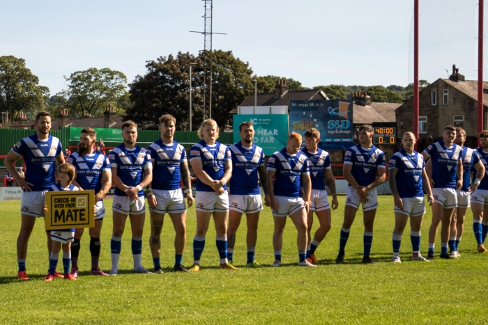 Barrow Raiders with the Check In With Your Mate sign.jpg